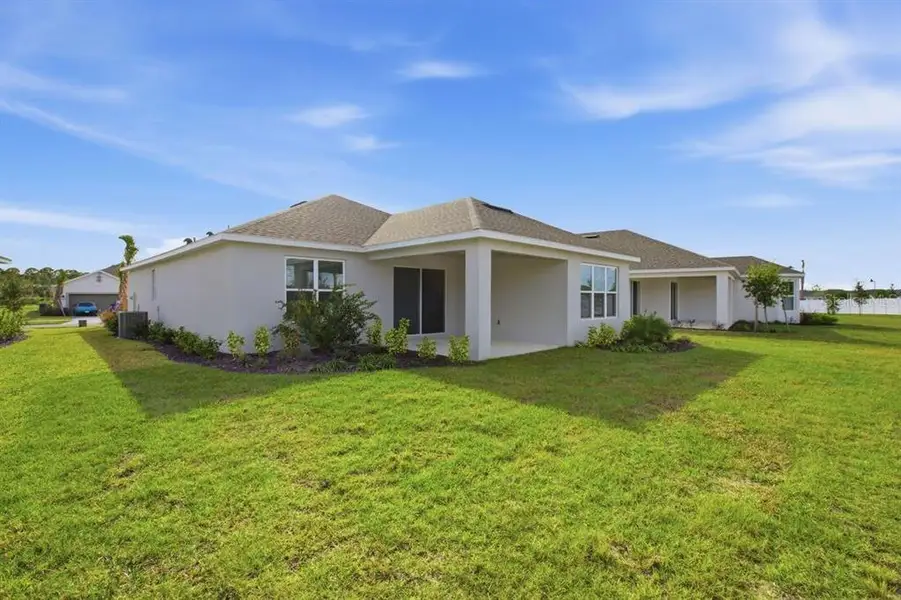 Exterior details and patio area of a home in Esplanade at Westview, Kissimmee (Image 3).