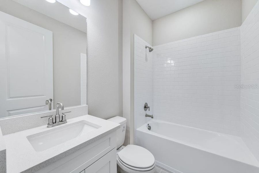 Furnished interior view inside a new home in Esplanade at Skye Ranch, Sarasota (Image 4).