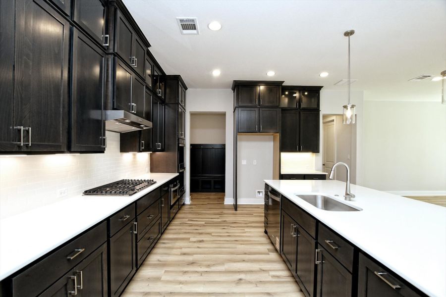 Representative furnished interior of a home built from the Vanderpool II by Giddens Homes in Whispering Wind, Bertram (Image 9).