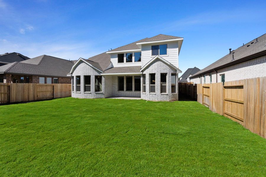 Exterior details and patio area of a home in The Trails, New Caney (Image 25).