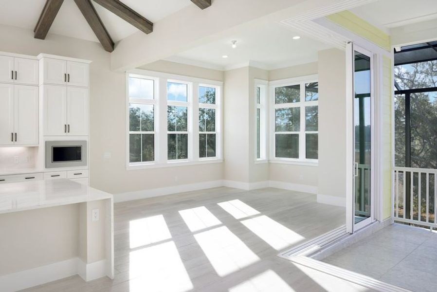 Representative unfurnished interior of a home built from the Grand Wayfarer by Minto Communities in Latitude Margaritaville Watersound, Panama City Beach (Image 15).