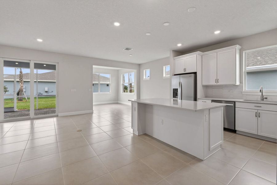 Furnished interior view inside a new home in Del Webb Tradition, Port St. Lucie (Image 49).