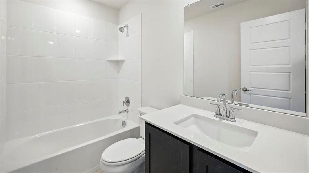Full bath with vanity and  shower combination