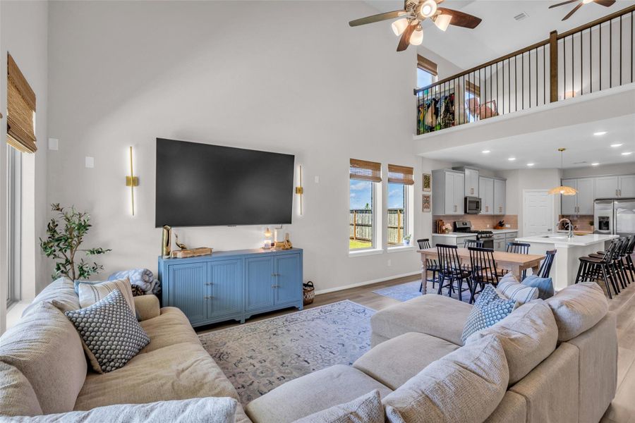 The first-floor living room provides a welcoming space for relaxing and spending time with family and guests.
