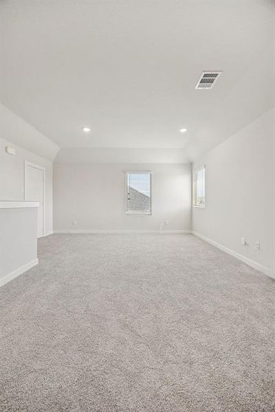 Game Room in the Stanley II home plan by Trophy Signature Homes – REPRESENTATIVE PHOTO