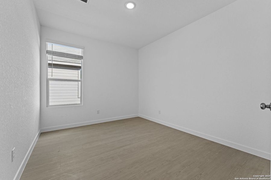 Spacious, unfurnished interior of a new home in Waterwheel: Coastline Collection, San Antonio (Image 22).