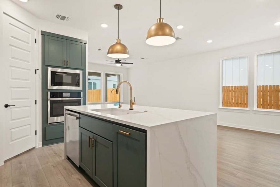 Furnished interior view inside a new home in Terrace Collection at Heritage, Dripping Springs (Image 9).