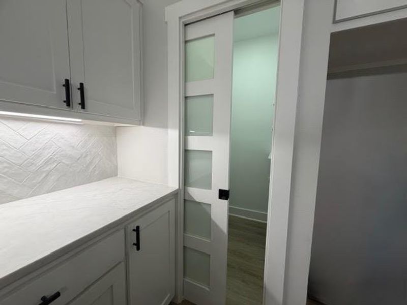 Furnished interior view inside a new home in , Mineola (Image 8).