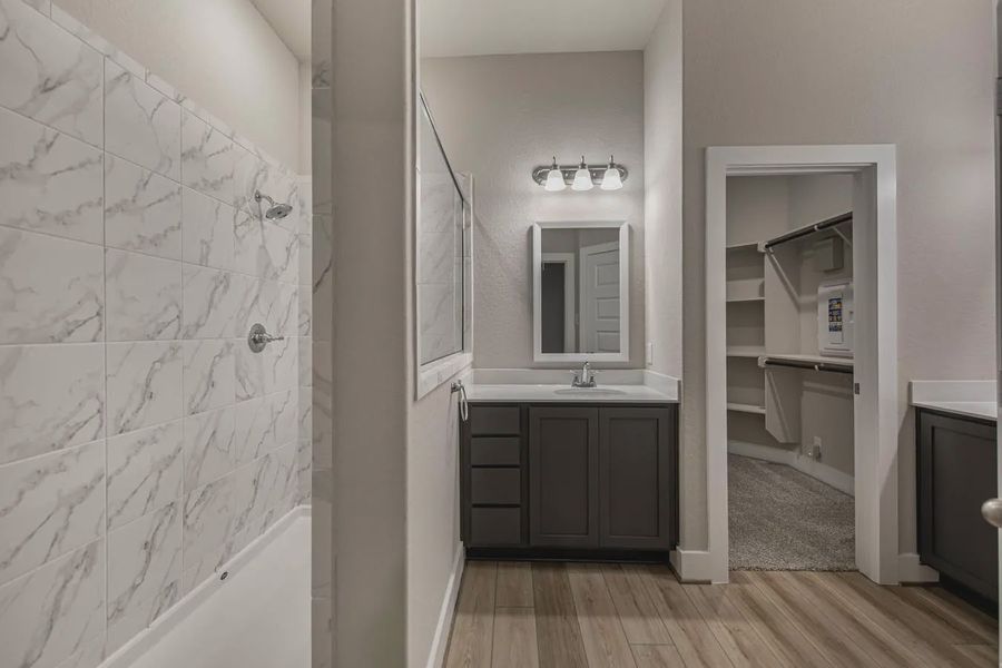 Representative furnished interior of a home built from the Jordy by Chesmar Homes in Stillwater Ranch, Buda (Image 11).