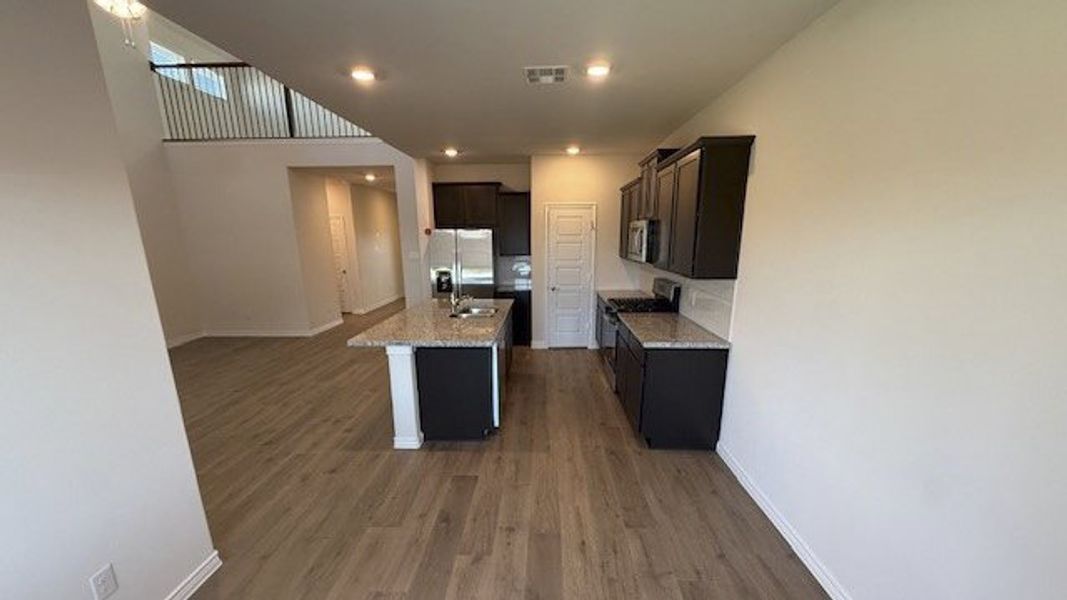 Furnished interior view inside a new home in Fireside by the Lake, Garland (Image 6).