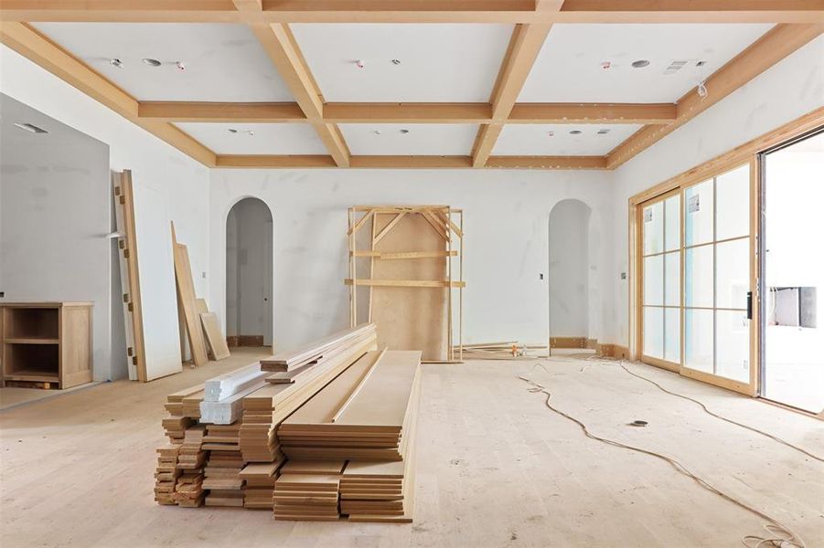 Miscellaneous room featuring coffered ceiling and beamed ceiling