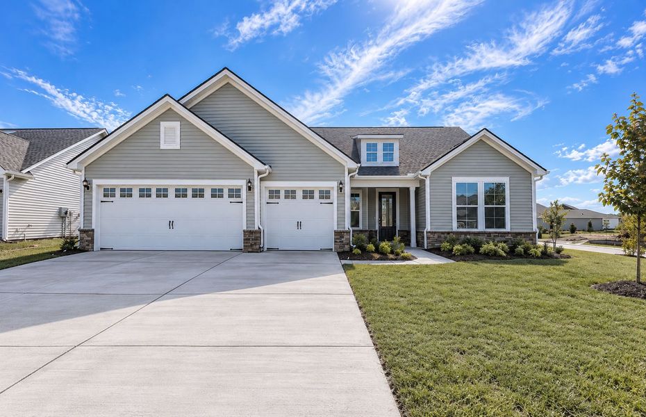 Front exterior of a new home in Crescent Cove, Myrtle Beach, SC, highlighting curb appeal (Image 18).