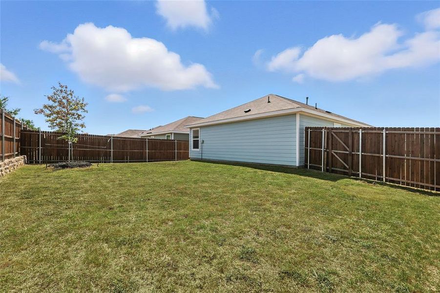 Front exterior of a new home in Preserve at Honey Creek: Cottage Collection, McKinney, TX, highlighting curb appeal (Image 2). Front exterior of a new home in Preserve at Honey Creek: Cottage Collection, McKinney, TX, highlighting curb appeal (Image 2).