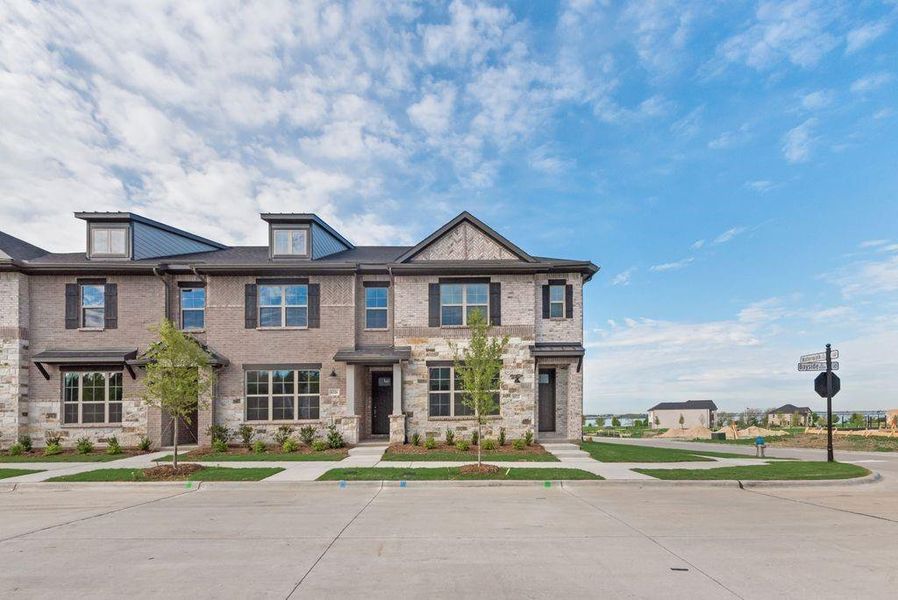 Front exterior of a new home in Bayside, Rowlett, TX, highlighting curb appeal (Image 19).