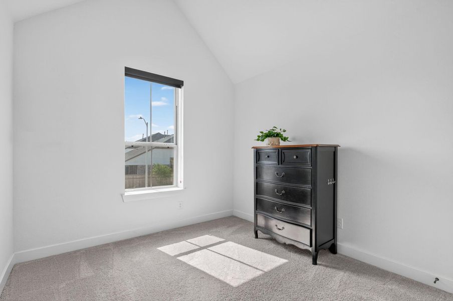 This secondary bedroom is located on the 2nd floor. Lots of natural light, high vaulted ceiling! 31418 Golden Cliffs Ln., Fulshear, TX 77441 This secondary bedroom is located on the 2nd floor. Lots of natural light, high vaulted ceiling! 31418 Golden Cliffs Ln., Fulshear, TX 77441