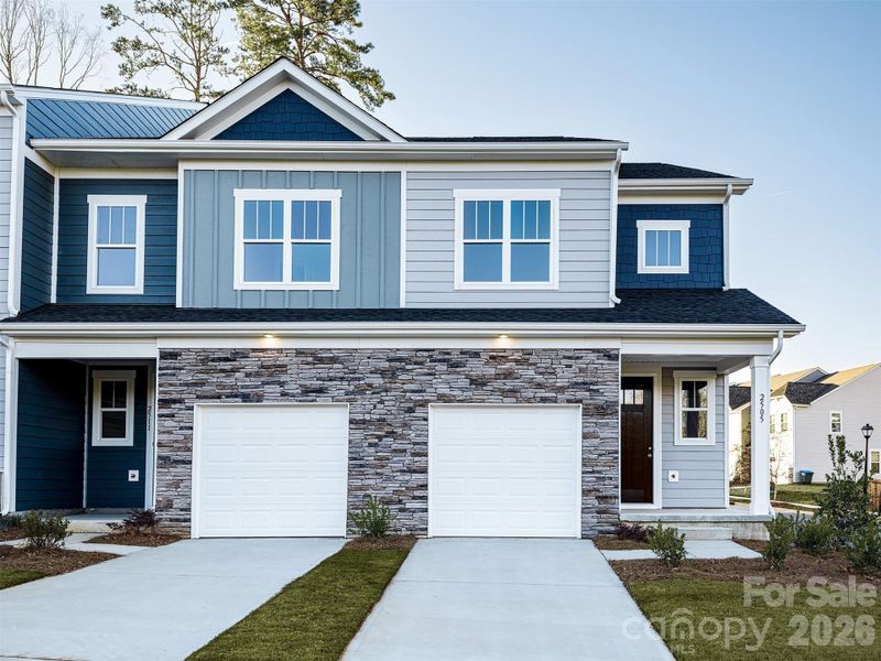 Front exterior of a new home in Ruby Dixon Crossing, Gastonia, NC, highlighting curb appeal (Image 1). Front exterior of a new home in Ruby Dixon Crossing, Gastonia, NC, highlighting curb appeal (Image 1).