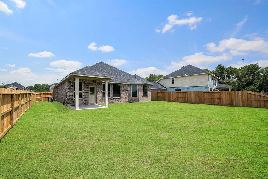 Spacious fenced backyard!