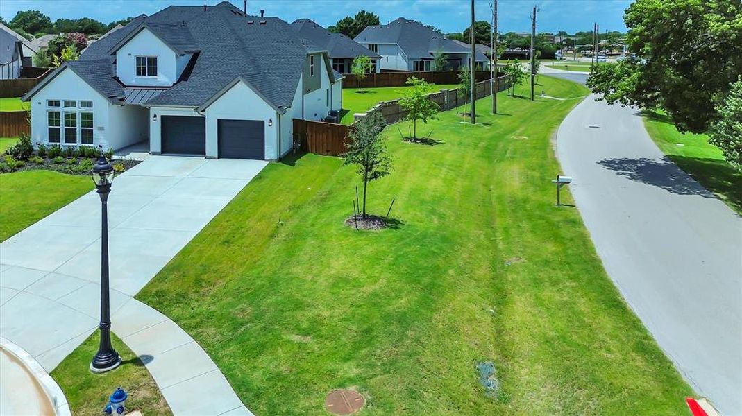 Front exterior of a new home in , Murphy, TX, highlighting curb appeal (Image 2). Front exterior of a new home in , Murphy, TX, highlighting curb appeal (Image 2).