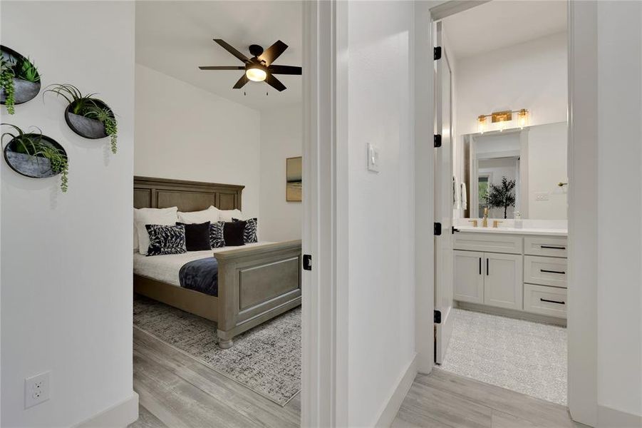 Bedroom #3 with Bath #3 next door. The tile flooring was a perfect match!