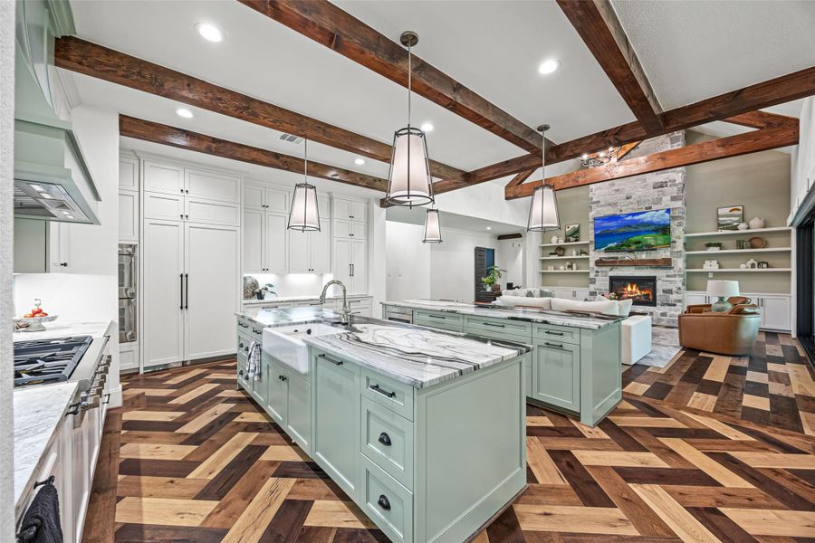 Panel-ready refrigerator and dishwasher blend seamlessly into the custom cabinetry for a clean, elevated look Panel-ready refrigerator and dishwasher blend seamlessly into the custom cabinetry for a clean, elevated look