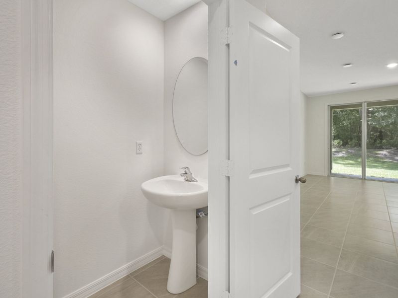 Furnished interior view inside a new home in Towns at Greenleaf, Oviedo (Image 13).