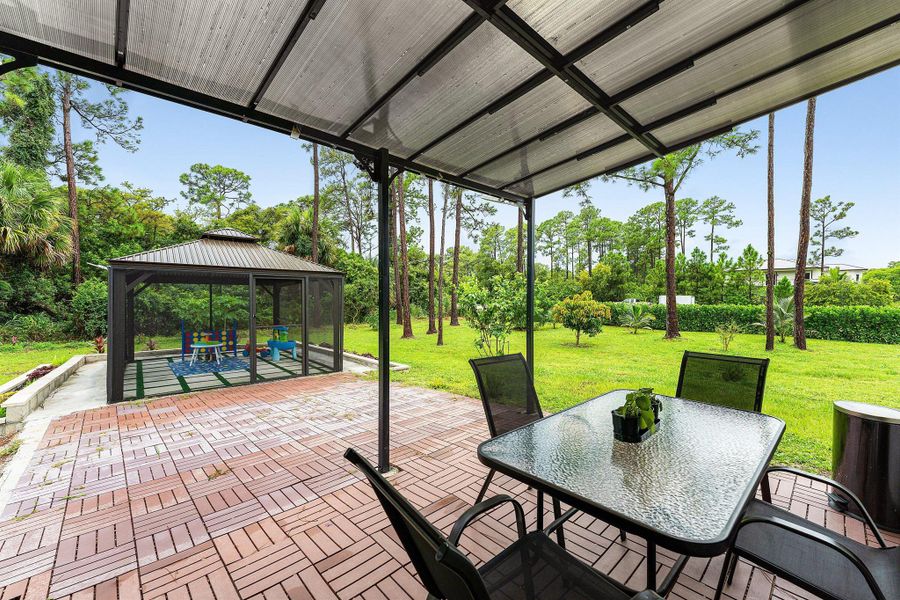 Exterior details and patio area of a home in , Loxahatchee (Image 1). Exterior details and patio area of a home in , Loxahatchee (Image 1).