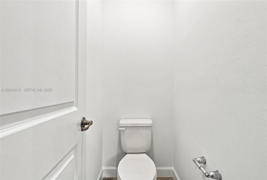 Furnished interior view inside a new home in Tradition, Port St. Lucie (Image 10).
