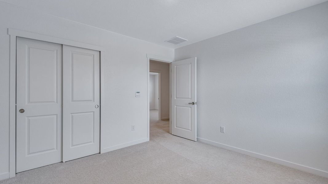 Spacious, unfurnished interior of a new home in Prairie Song, Windsor (Image 25).