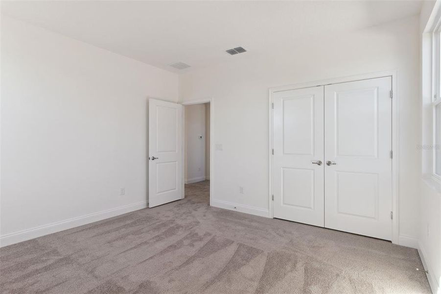 Spacious, unfurnished interior of a new home in Tamarack at Two Rivers, Zephyrhills (Image 42).
