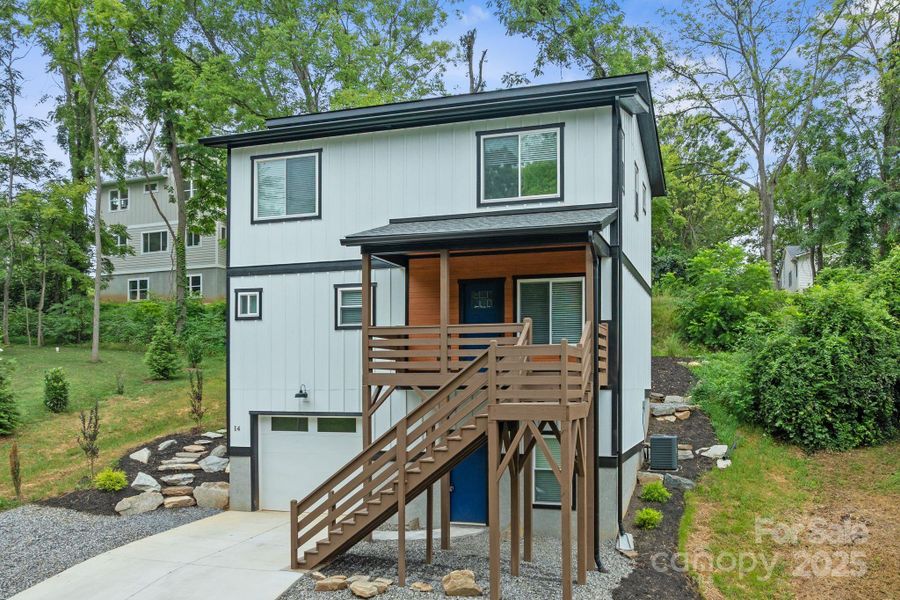 Front exterior of a new home in , Asheville, NC, highlighting curb appeal (Image 25). Front exterior of a new home in , Asheville, NC, highlighting curb appeal (Image 25).
