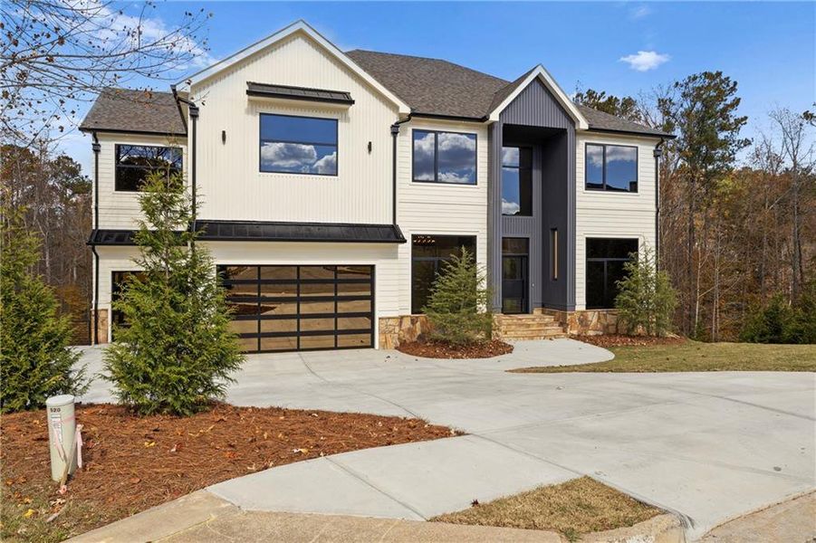 Front exterior of a new home in , Milton, GA, highlighting curb appeal (Image 26).