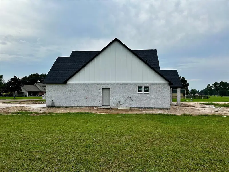Exterior details and patio area of a home in , Waller (Image 10). Exterior details and patio area of a home in , Waller (Image 10).