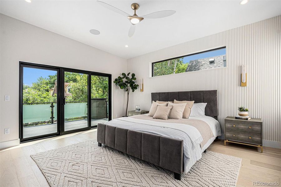 Incredible primary suite with private balcony