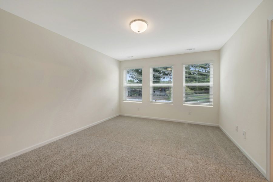 Spacious, unfurnished interior of a new home in Townes on Leesville, Durham (Image 24).