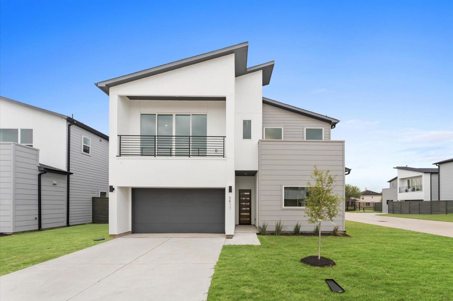 Front exterior of a new home in , Missouri City, TX, highlighting curb appeal (Image 26). Front exterior of a new home in , Missouri City, TX, highlighting curb appeal (Image 26).