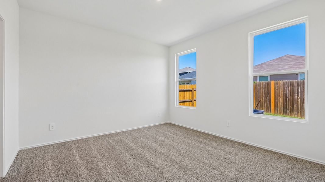 Spacious, unfurnished interior of a new home in Wayside, Uhland (Image 25).