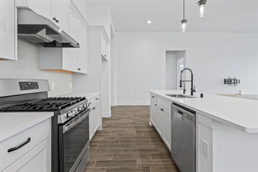 Furnished interior view inside a new home in Meridiana, Iowa Colony (Image 7).