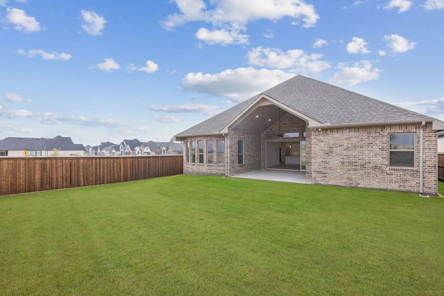 Exterior details and patio area of a home in Trinity Falls, McKinney (Image 2). Exterior details and patio area of a home in Trinity Falls, McKinney (Image 2).