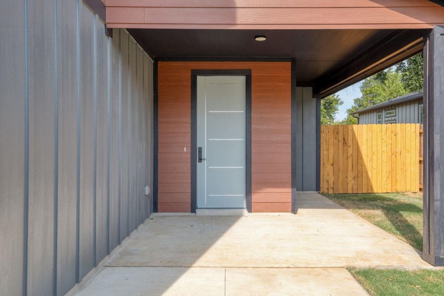 Doorway to property with a patio Doorway to property with a patio