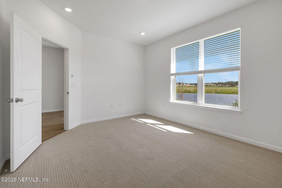 Spacious, unfurnished interior of a new home in Brook Forest, St. Augustine (Image 17).