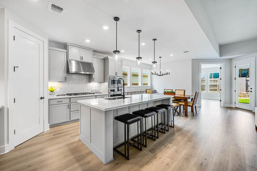 Furnished interior view inside a new home in 6 Creeks, Kyle (Image 3).