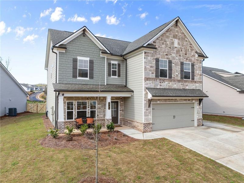 Front exterior of a new home in , Gainesville, GA, highlighting curb appeal (Image 24).