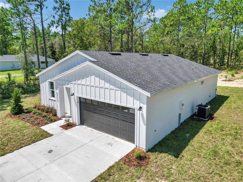 Front exterior of a new home in , Dunnellon, FL, highlighting curb appeal (Image 2). Front exterior of a new home in , Dunnellon, FL, highlighting curb appeal (Image 2).