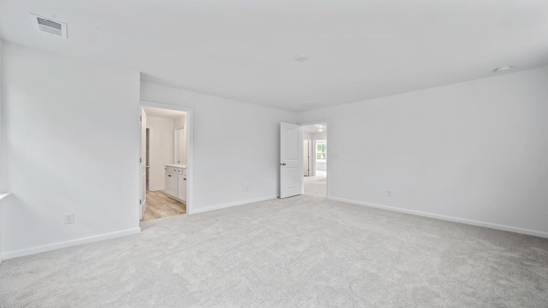 Spacious, unfurnished interior of a new home in Creekside at Andrews, Summerville (Image 16).