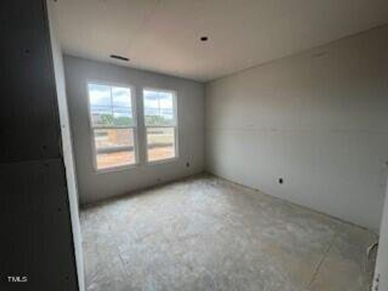 Spacious, unfurnished interior of a new home in Wellers Knoll, Lillington (Image 29).