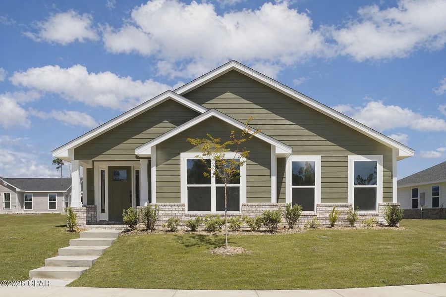 Front exterior of a new home in East Bay, Panama City, FL, highlighting curb appeal (Image 1). Front exterior of a new home in East Bay, Panama City, FL, highlighting curb appeal (Image 1).