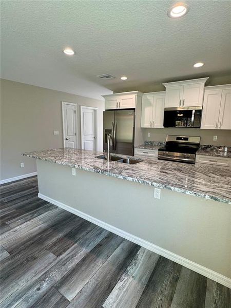 Furnished interior view inside a new home in , Dunnellon (Image 4).