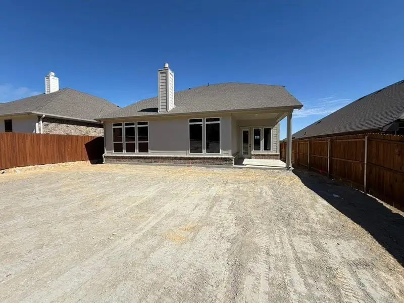 Exterior details and patio area of a home in Waterford Park, Weatherford (Image 2). Exterior details and patio area of a home in Waterford Park, Weatherford (Image 2).