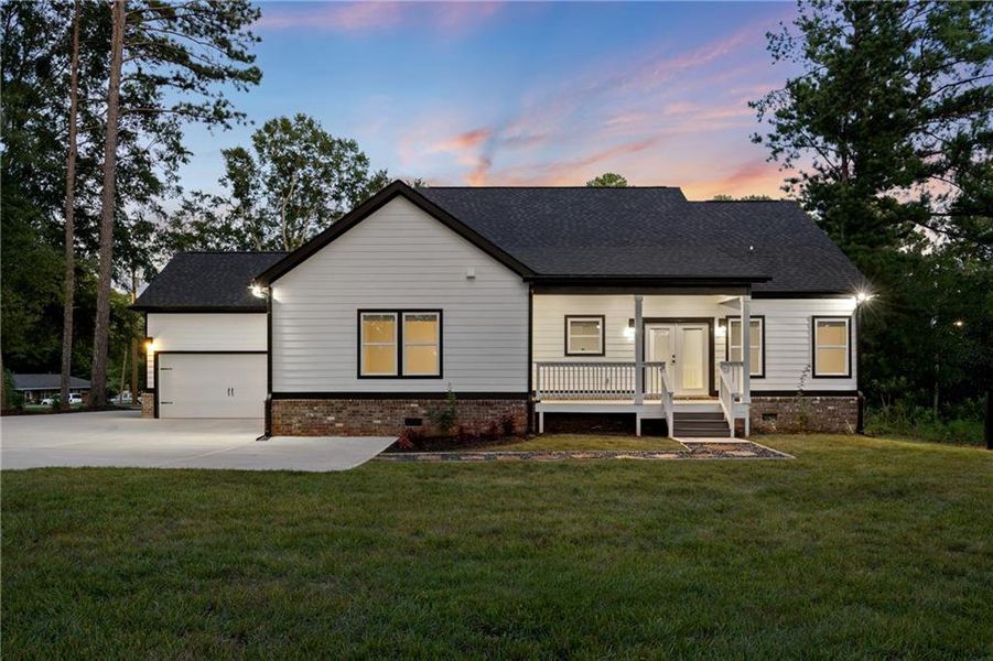 Front exterior of a new home in , Monroe, GA, highlighting curb appeal (Image 29). Front exterior of a new home in , Monroe, GA, highlighting curb appeal (Image 29).