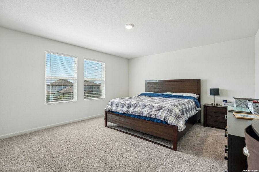 Furnished interior view inside a new home in Hennersby Hollow, San Antonio (Image 42).